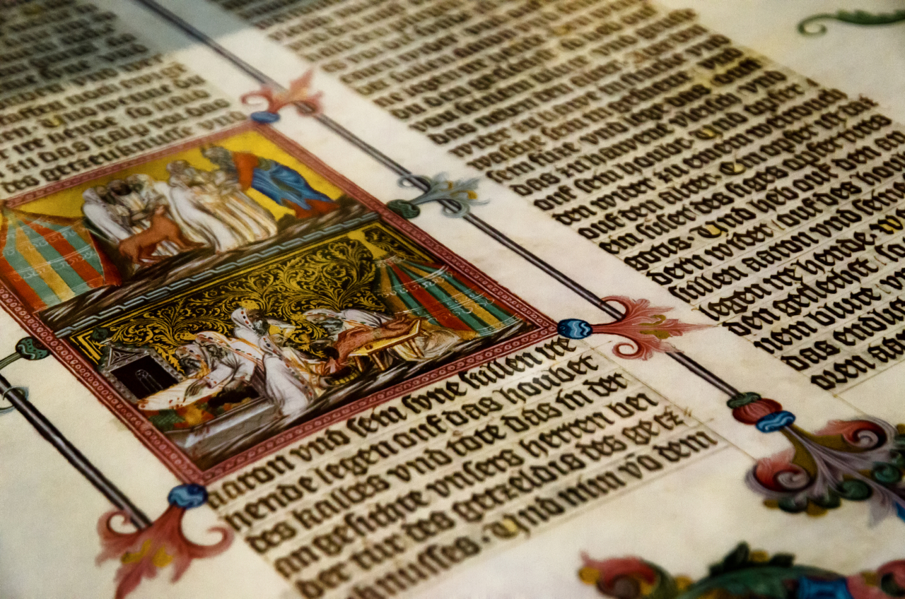 An ancient tome with miniature illustration.