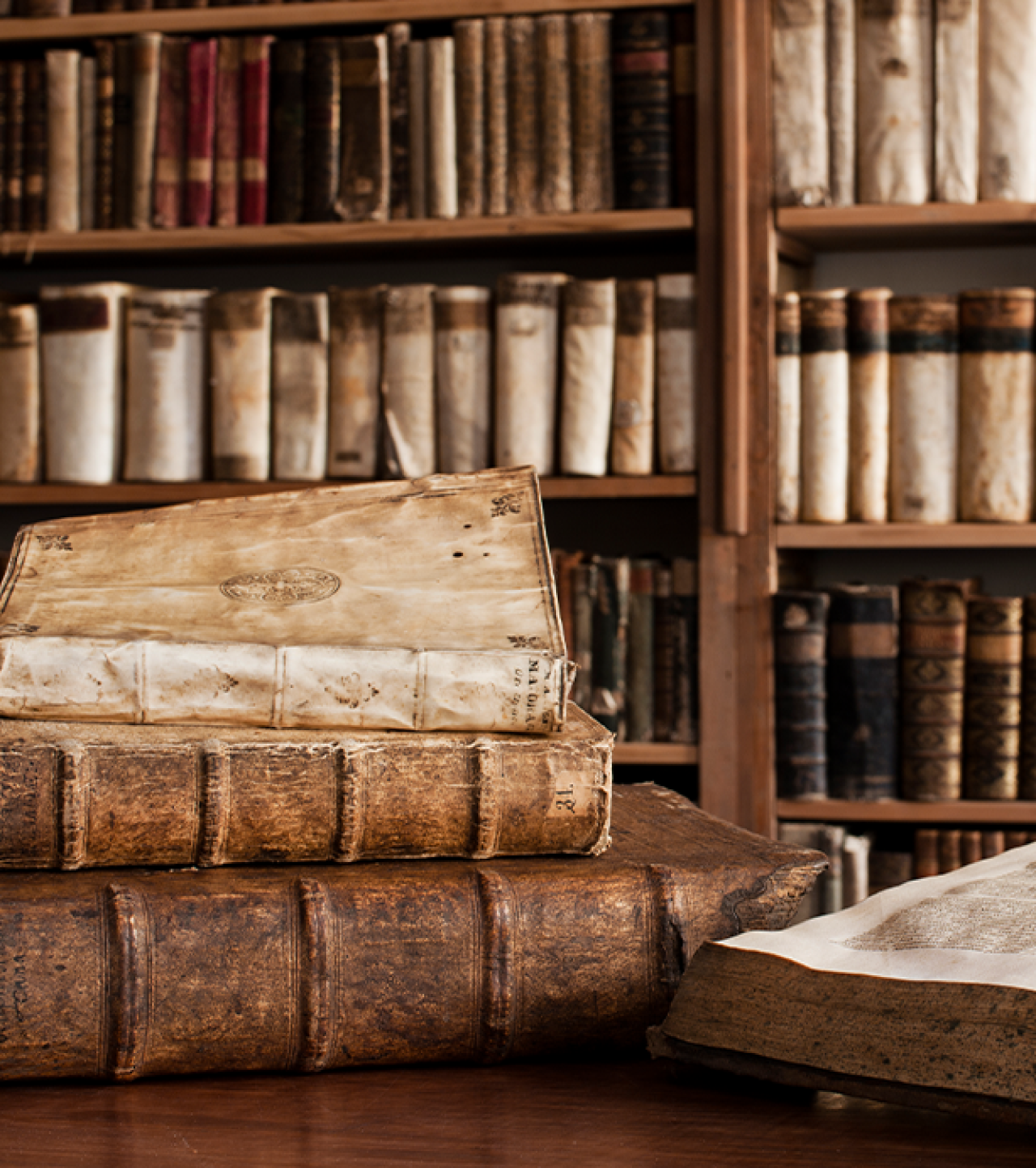 Old books in library and on table.