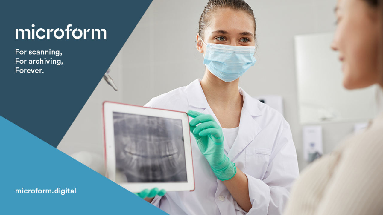 Microform Branding - Medical employees looking at a digital screen.